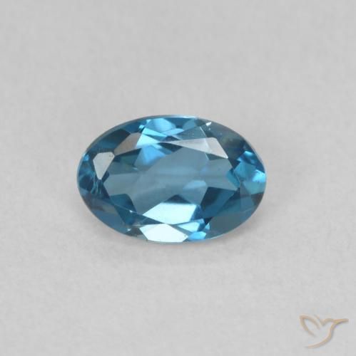 0.59ct Natural Azul Londres Topacio, Ovalada, VVS