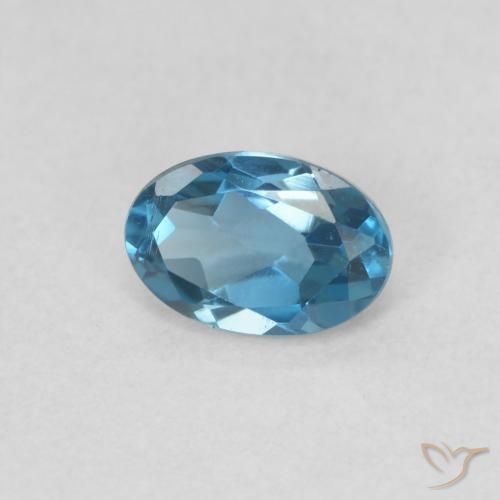 Topacio Azul Londres natural de 0.59 ct, Ovalada, VVS