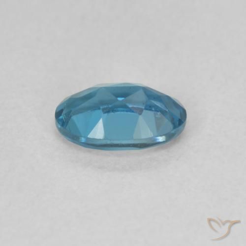 Topacio Azul Londres natural de 0.59 ct, Ovalada, VVS
