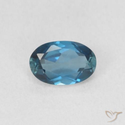 0.59ct Natural Azul Londres Topacio, Ovalada, VVS-VS