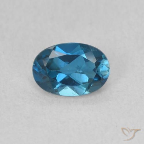 0.63ct Natural Azul Londres Topacio, Ovalada, VVS-VS
