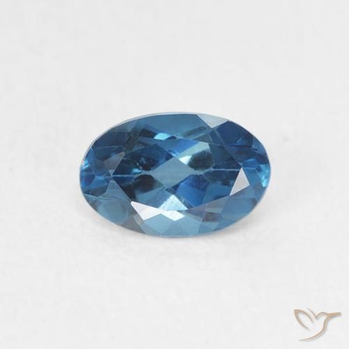 0.60ct Natural Azul Londres Topacio, Ovalada, VVS-VS