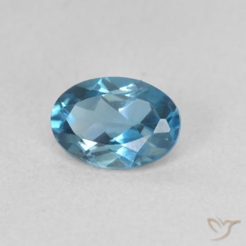 Topacio Azul Londres natural de 0.61 ct, Ovalada, VVS-VS