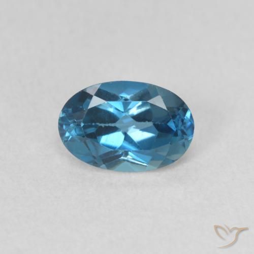 0.59ct Natural Azul Londres Topacio, Ovalada, VVS-VS