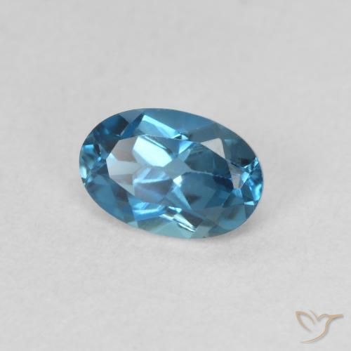Topacio Azul Londres natural de 0.59 ct, Ovalada, VVS-VS