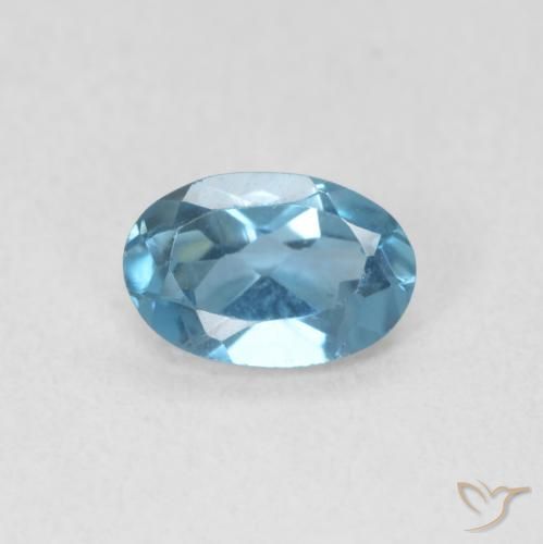 0.59ct Natural Azul Londres Topacio, Ovalada, VVS-VS, Photo A