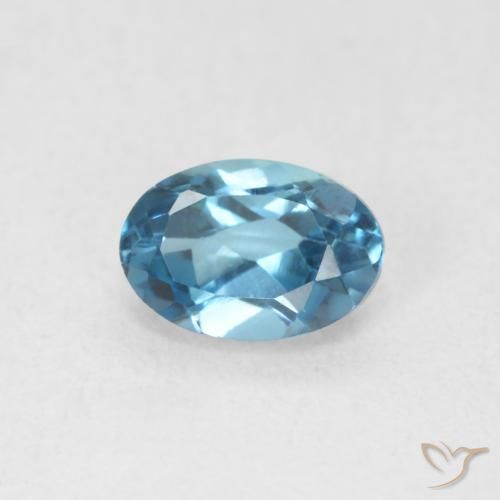 0.69ct Natural Azul Londres Topacio, Ovalada, VVS-VS