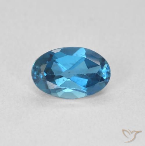 0.60ct Natural Azul Londres Topacio, Ovalada, VVS-VS