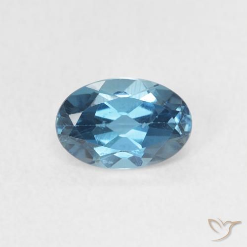 0.56ct Natural Azul Londres Topacio, Ovalada, VVS-VS