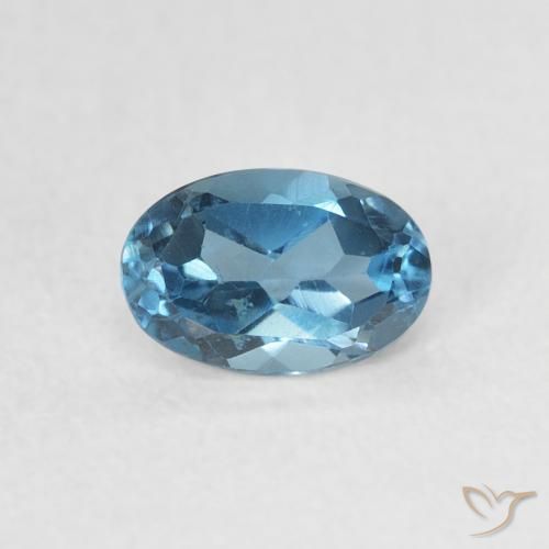 0.61ct Natural Azul Londres Topacio, Ovalada, VVS-VS
