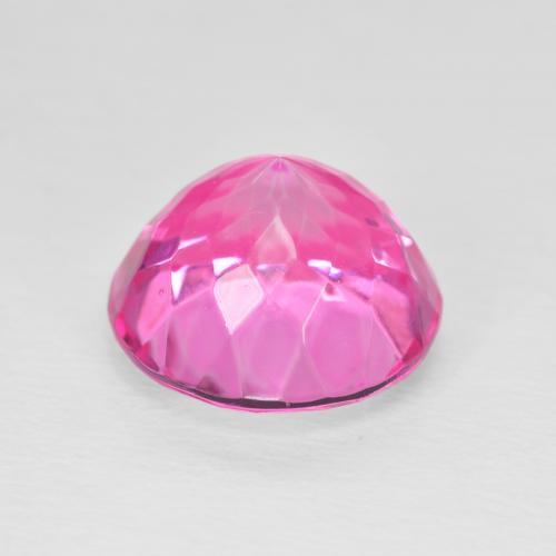 Topacio Magenta intenso natural de 7.09 ct, Redondo, VVS