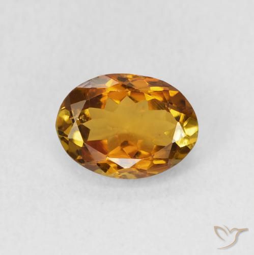1.27ct Natural Golden Orange to Deep Brown turmalina, Ovalada, VS