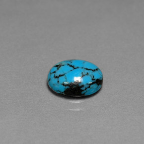 Turquesa azul natural de 1,55 ct, corte óvalo, opaco