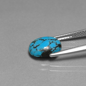 Turquesa azul natural de 1,55 ct, corte óvalo, opaco