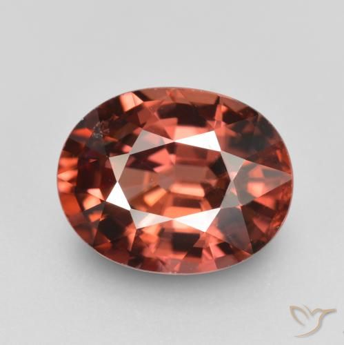 Circón Rojo oscuro medio natural de 3.06 ct, Corte Óvalo, VS
