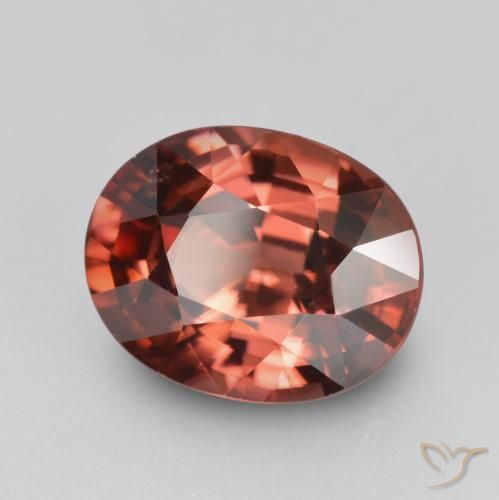 Circón Rojo oscuro medio natural de 3.06 ct, Corte Óvalo, VS