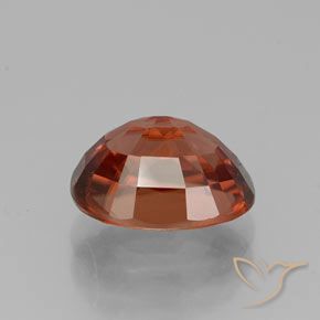 Circón Rojo medio natural de 3.38 ct, Ovalada, VVS