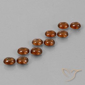 Gemas de Circón Naranja oscuro natural de 10.23 ct, Ovalada, Transparente