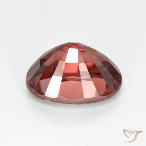 Circón Rojo merlot natural de 2.96 ct, Ovalada, VS