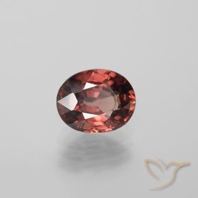 Circón Rojo oscuro medio natural de 3.44 ct, Ovalada, VVS-VS