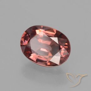 Circón Rojo vino natural de 2.74 ct, Ovalada, VS