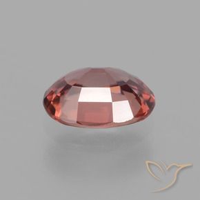 Circón Rojo vino natural de 2.74 ct, Ovalada, VS