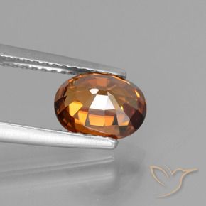 Circón Naranja oscuro medio natural de 2.47 ct, Ovalada, VS