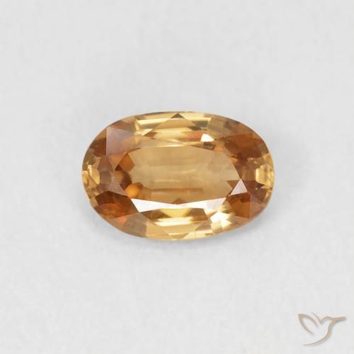 0.65ct Natural Naranja marrón Circón, Ovalada, VVS