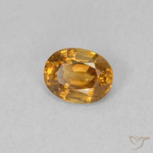 Circón Marrón naranja natural de 0.59 ct, Ovalada, VVS-VS