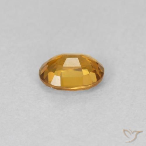 Circón Marrón naranja natural de 0.59 ct, Ovalada, VVS-VS