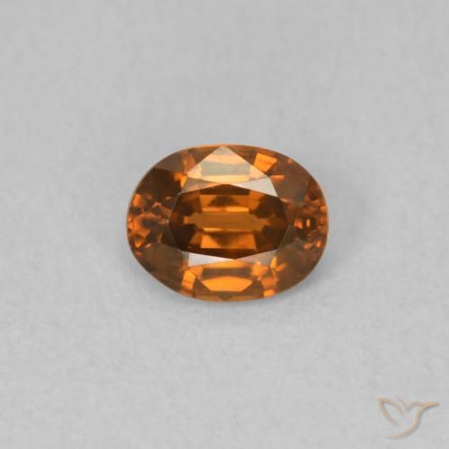 0.59ct Natural Naranja oscuro Circón, Ovalada, VVS-VS