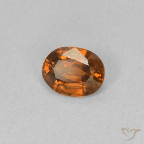 Circón Naranja oscuro natural de 0.59 ct, Ovalada, VVS-VS