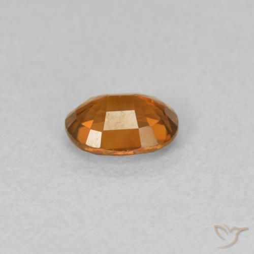 Circón Naranja oscuro natural de 0.59 ct, Ovalada, VVS-VS