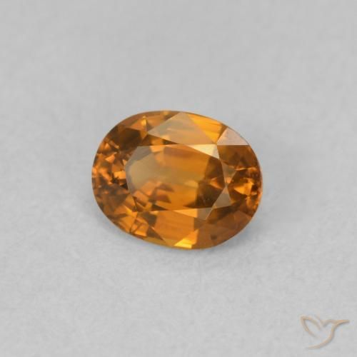Circón Naranja oscuro natural de 0.60 ct, Ovalada, VVS-VS