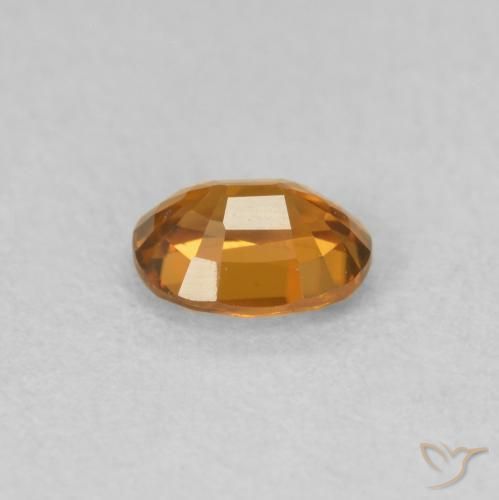 Circón Naranja oscuro natural de 0.60 ct, Ovalada, VVS-VS