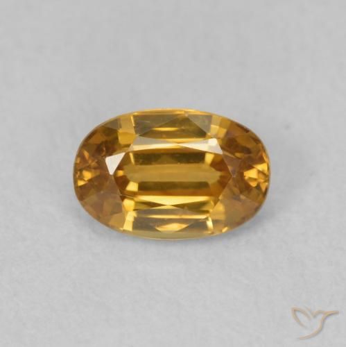 0.78ct Natural Naranja oscuro Circón, Ovalada, VVS-VS
