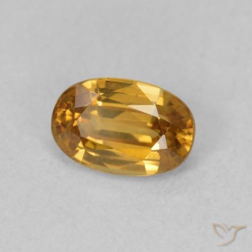 Circón Naranja oscuro natural de 0.78 ct, Ovalada, VVS-VS