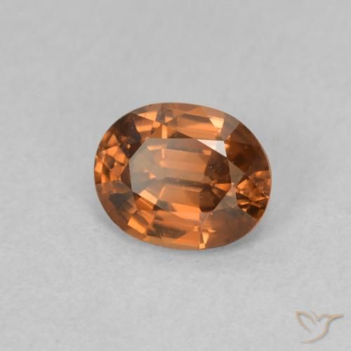 Circón Medium Dark-Orange natural de 0.87 ct, Ovalada, VVS-VS