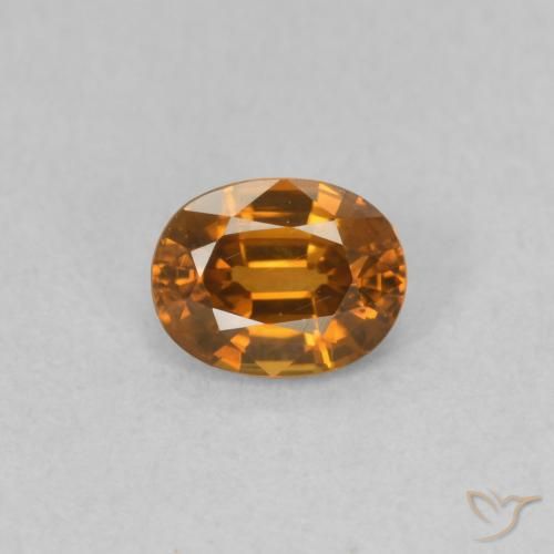 0.63ct Natural Naranja medio Circón, Ovalada, VVS-VS