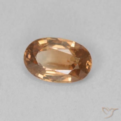 Circón Dorado naranja natural de 0.64 ct, Ovalada, VVS-VS