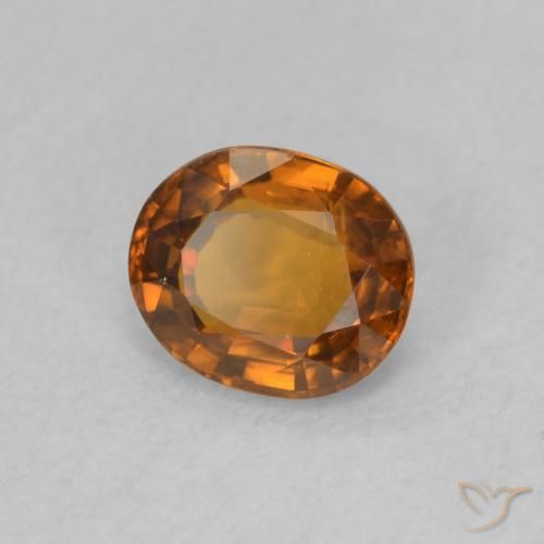 Circón Naranja oscuro natural de 0.88 ct, Ovalada, VVS-VS