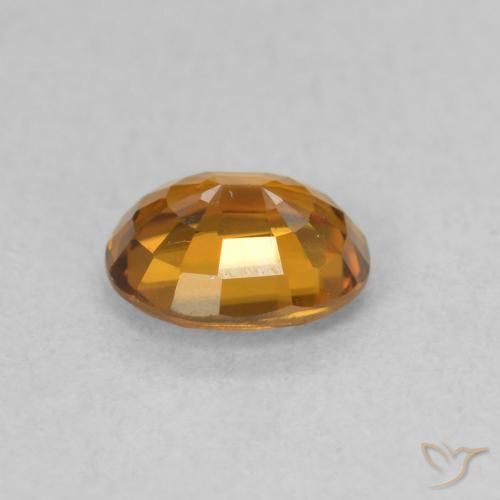 Circón Naranja oscuro natural de 0.88 ct, Ovalada, VVS-VS