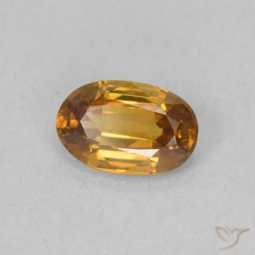 Circón Naranja medio natural de 0.63 ct, Ovalada, VVS-VS
