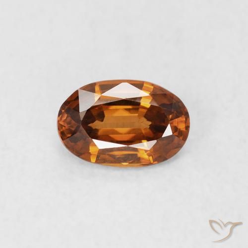 0.66ct Natural Naranja terroso Circón, Ovalada, VS