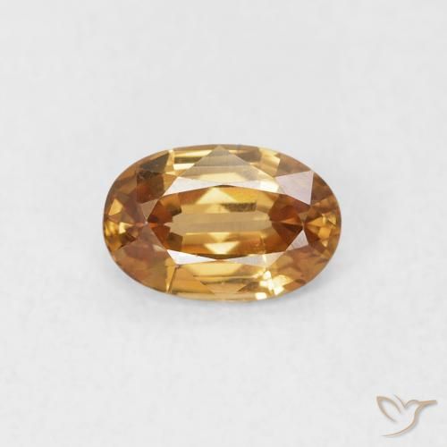 0.69ct Natural Naranja óxido Circón, Ovalada, VVS-VS