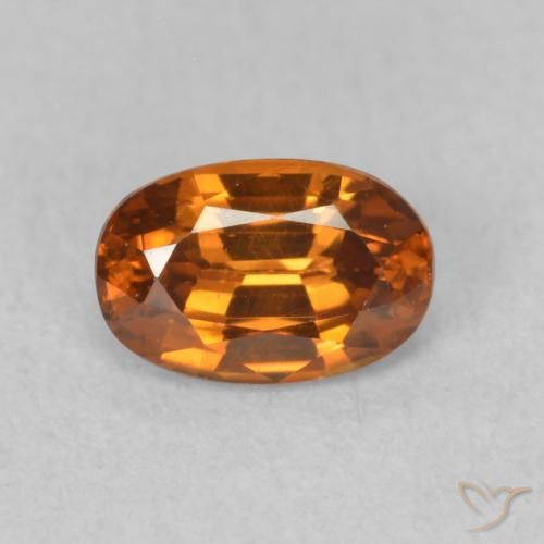 0.73ct Natural Naranja marrón Circón, Ovalada, VVS-VS