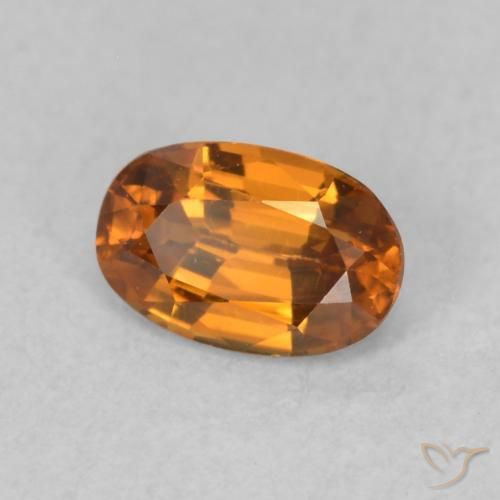 Circón Naranja marrón natural de 0.73 ct, Ovalada, VVS-VS