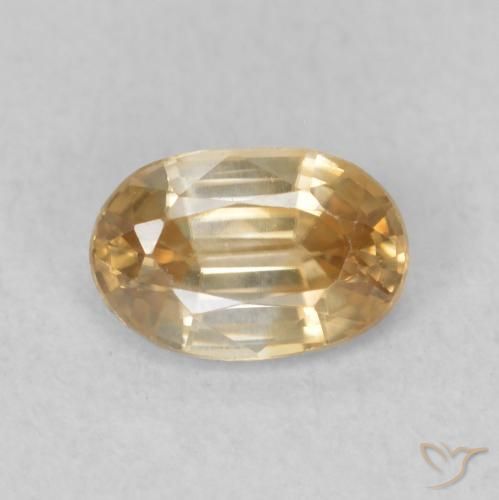 0.71ct Natural Oro Circón, Ovalada, VVS-VS