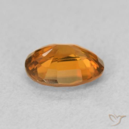 Circón Medium Dark-Orange natural de 0.84 ct, Ovalada, VVS-VS