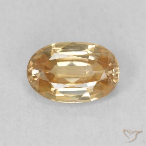 0.70ct Natural Dorado durazno claro Circón, Ovalada, VVS-VS
